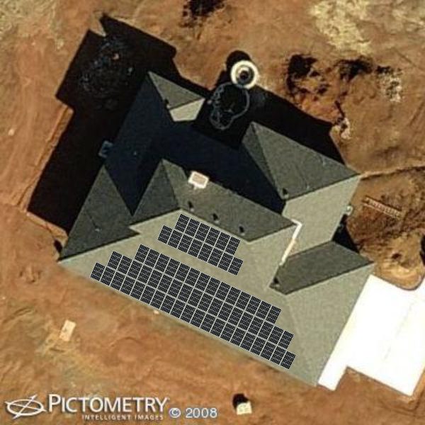 A satellite image of a house with solar panels on the roof.